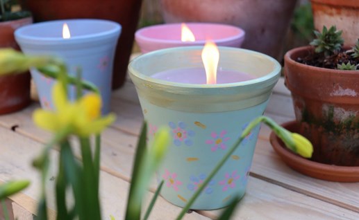 Transform flowerpots into an outdoor candle